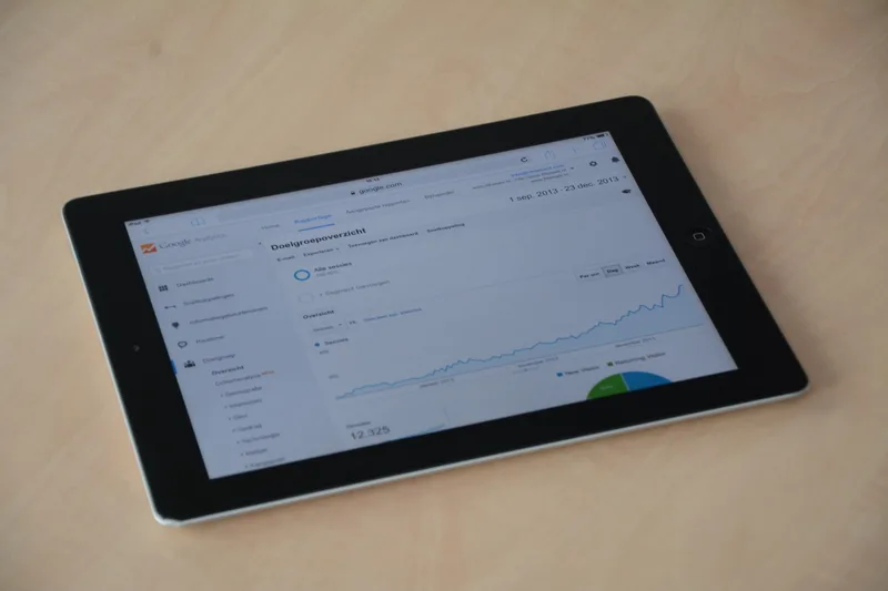 Etsy Shop Manager showing listing stats with views, favorites, and conversion rate data