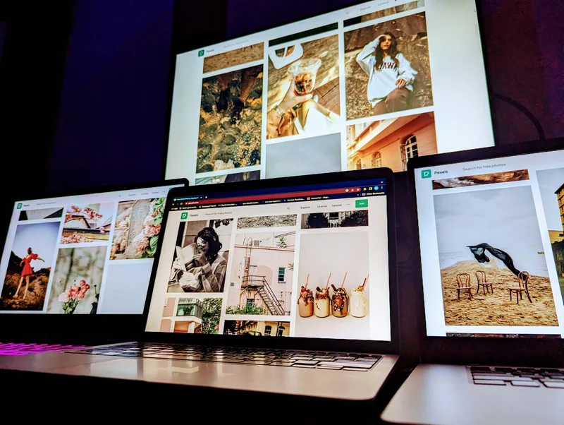 Digital art product types displayed on a designer’s desk including printable art, illustration files, and digital pattern samples